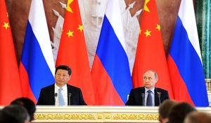 Russia Is a Rogue, Not a Peer; China Is a Peer, Not a Rogue: Different Challenges, Different Responses